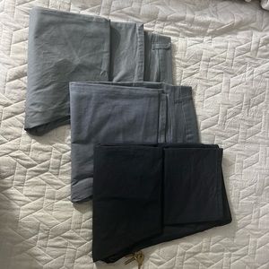 3 pairs of Kennith Cole chinos.